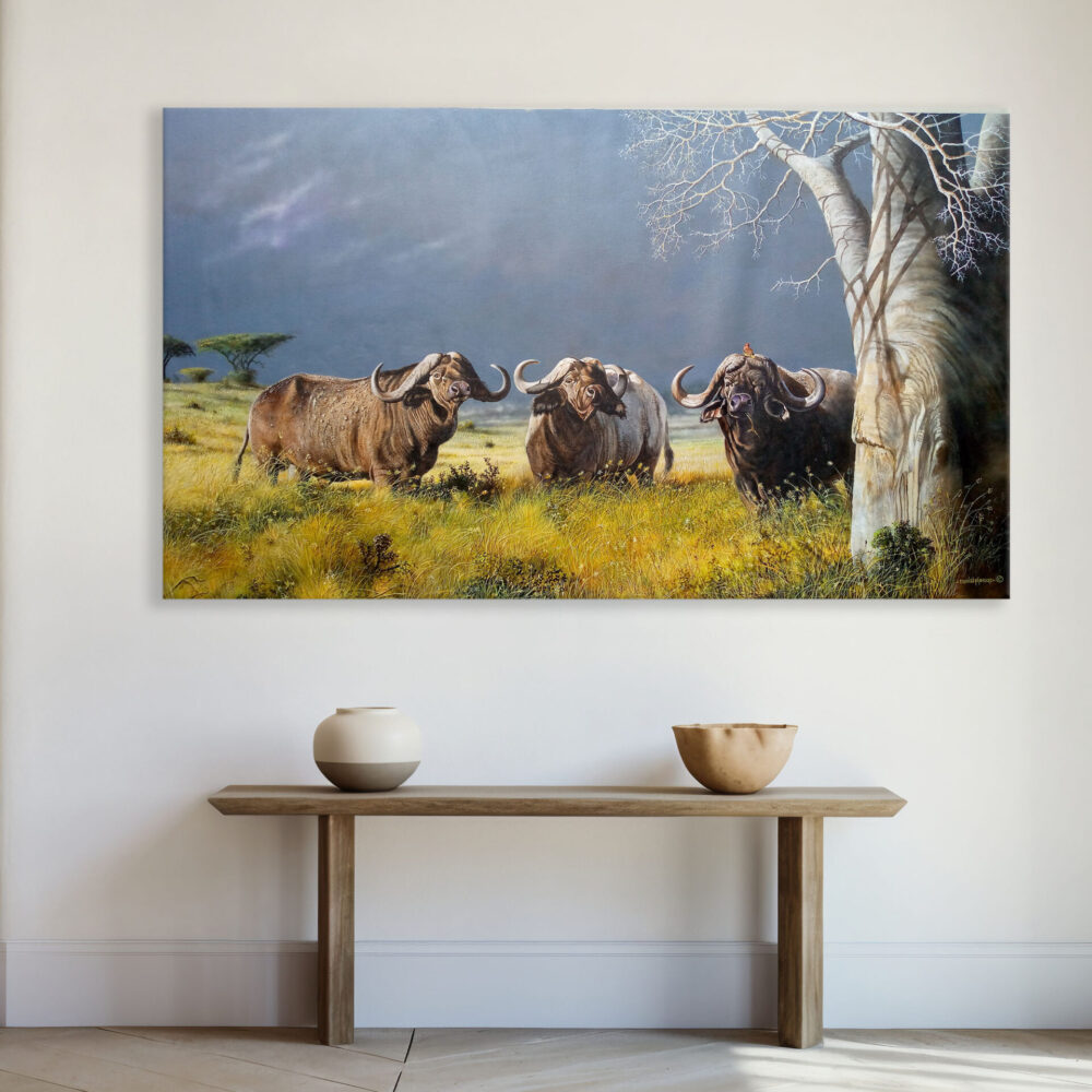 A mounted painting of three buffaloes standing in the African grasslands - By Daniel Njoroge