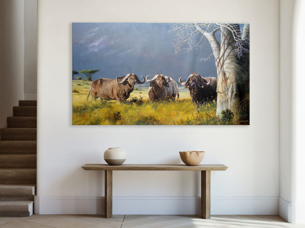 A mounted painting of three buffaloes standing in the African grasslands - By Daniel Njoroge